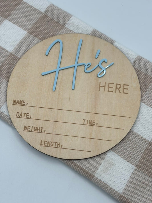 He's Here sign